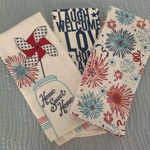 Three red/white/blue dish towels. Never used.